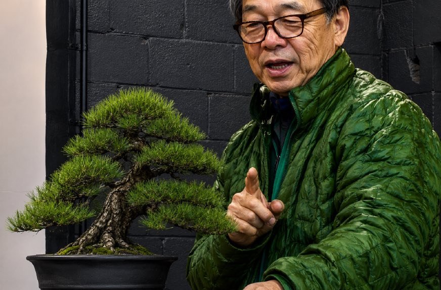 Suthin Sukosolvisit teaching beside a Japanese black pine bonsai.