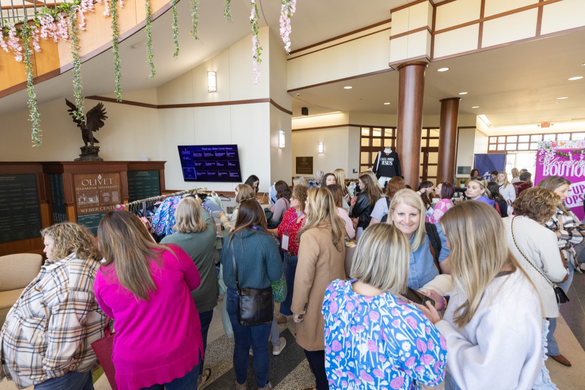Women connecting in the conference lobby
